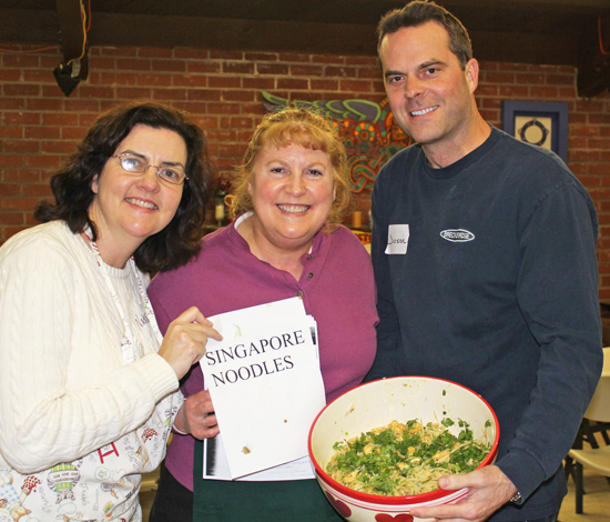 Natalie, Lisa and Jason show off their Singapore Noodle dish