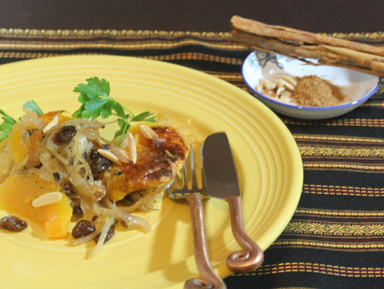 Moroccan Squash with Caramelized Onions pictured with Ceylon cinnamon in the background.