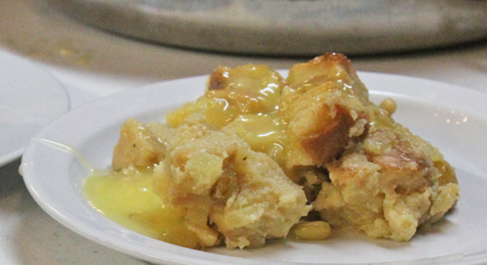 Bread Pudding with Pineapple and Raisins smothered in Tequila Sauce