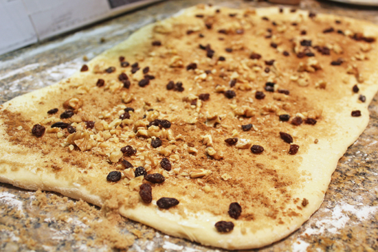 Sprinkle the good stuff all over the dough. 