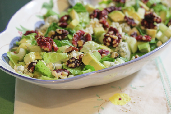 The red walnuts look like little jewels against the green of the lettuce, celery, avocado and apple.