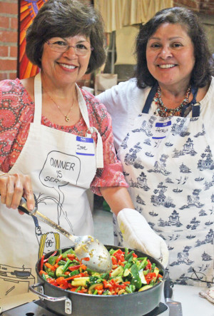 Irene and Patricia ready to serve Balti Stir-fried Vegetables with Cashews.