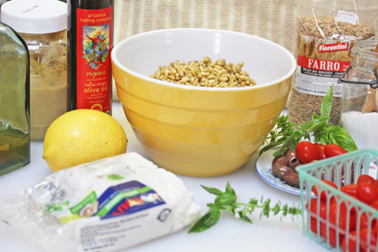 Ingredients in Italian Farro Salad with grape tomatoes, feta and Kalamata olives. 