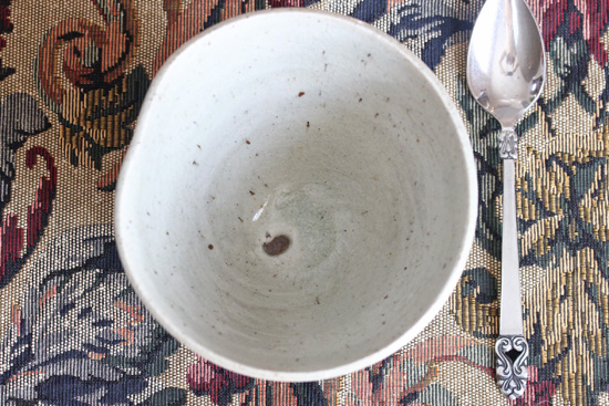 Stoneware bowl by Raulee Marcus with traditional Asian celadon glaze.